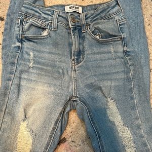 Light blue jeans with rips size 0/24